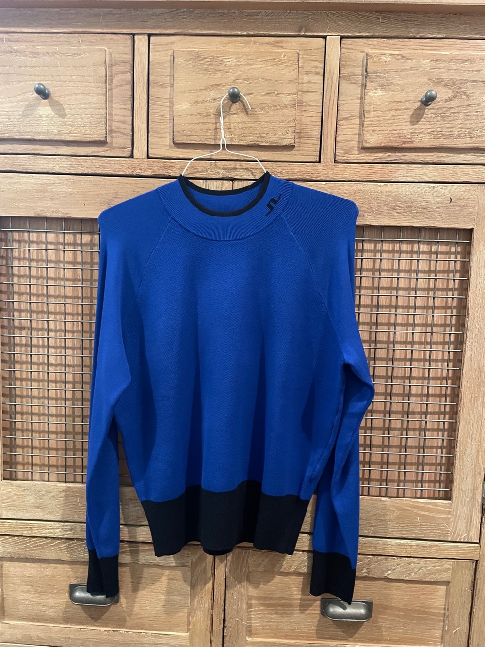J. Lindeberg woman’s Blue Contrast Hem golf Sweater